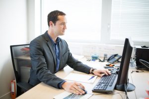 man working on laptop